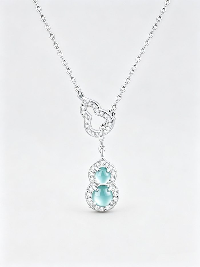 Hulu‑gourd necklace made of natural blue‑water jade and hypoallergenic S999 pure silver. This oriental‑style pendant brings fortune, delivered with gift‑box and authenticity certificate.